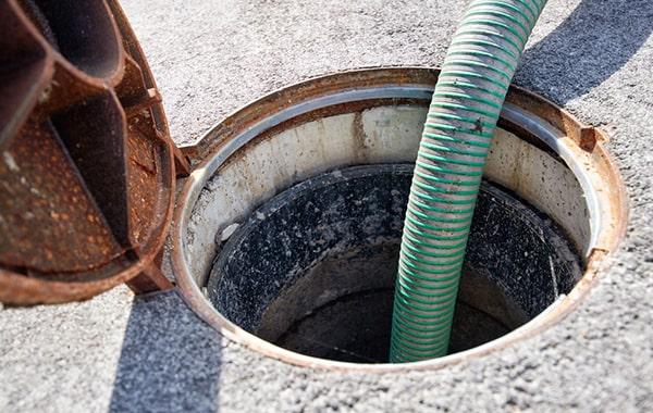 grease trap pumping involves removing built-up grease, oils, and fats from the trap to prevent clogs in the plumbing system